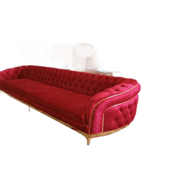 A luxury red velvet 3 seats sofa